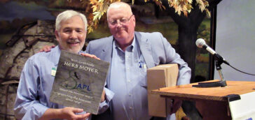 Long-time SAPL President Herb Moyer receives an award of appreciation for his years of service