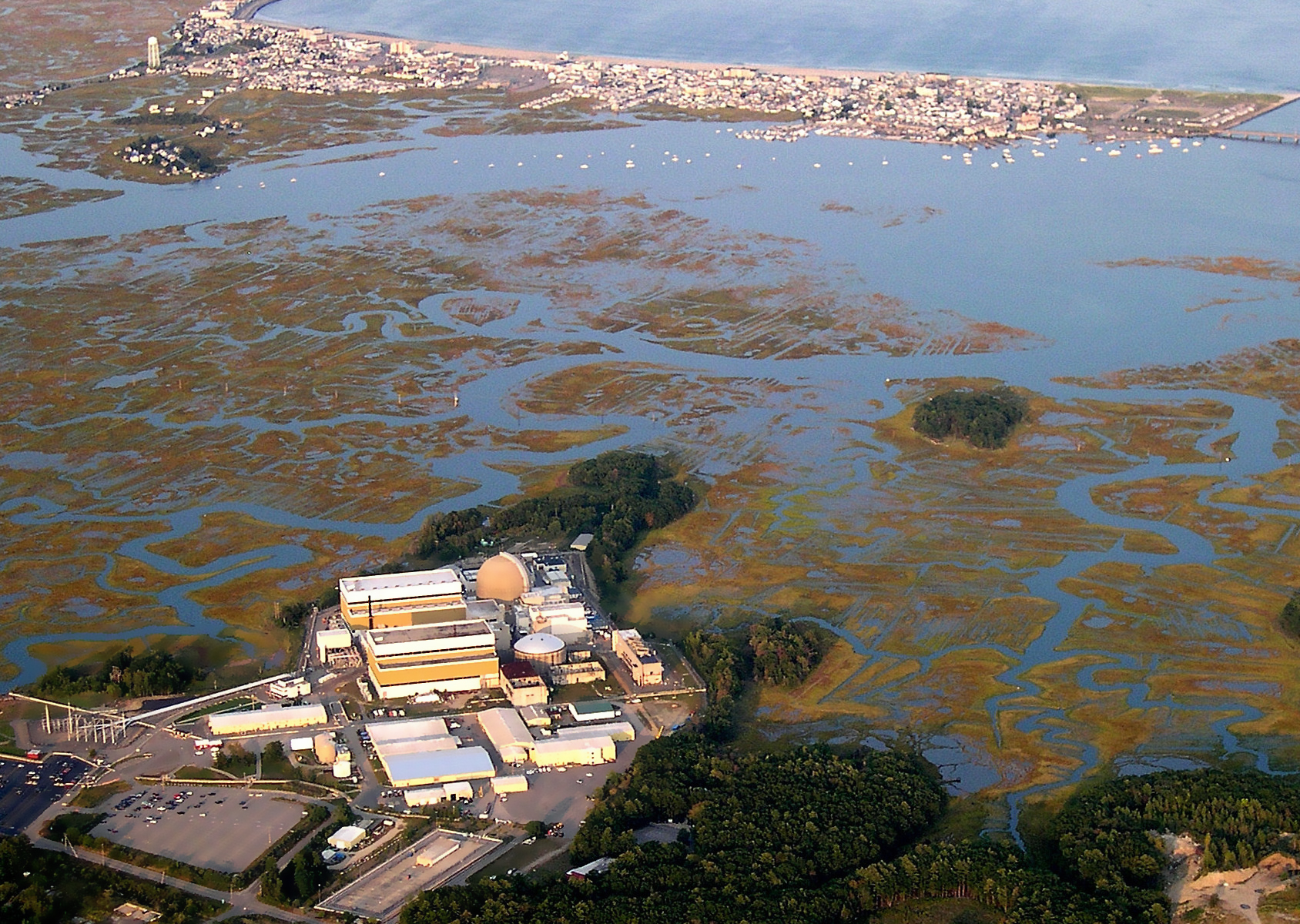 								 								 Seabrook Station is uniquely vulnerable to storm surge inundation. Aerial photo courtesy of Ed Friedman, POV Heli-services					 								 														